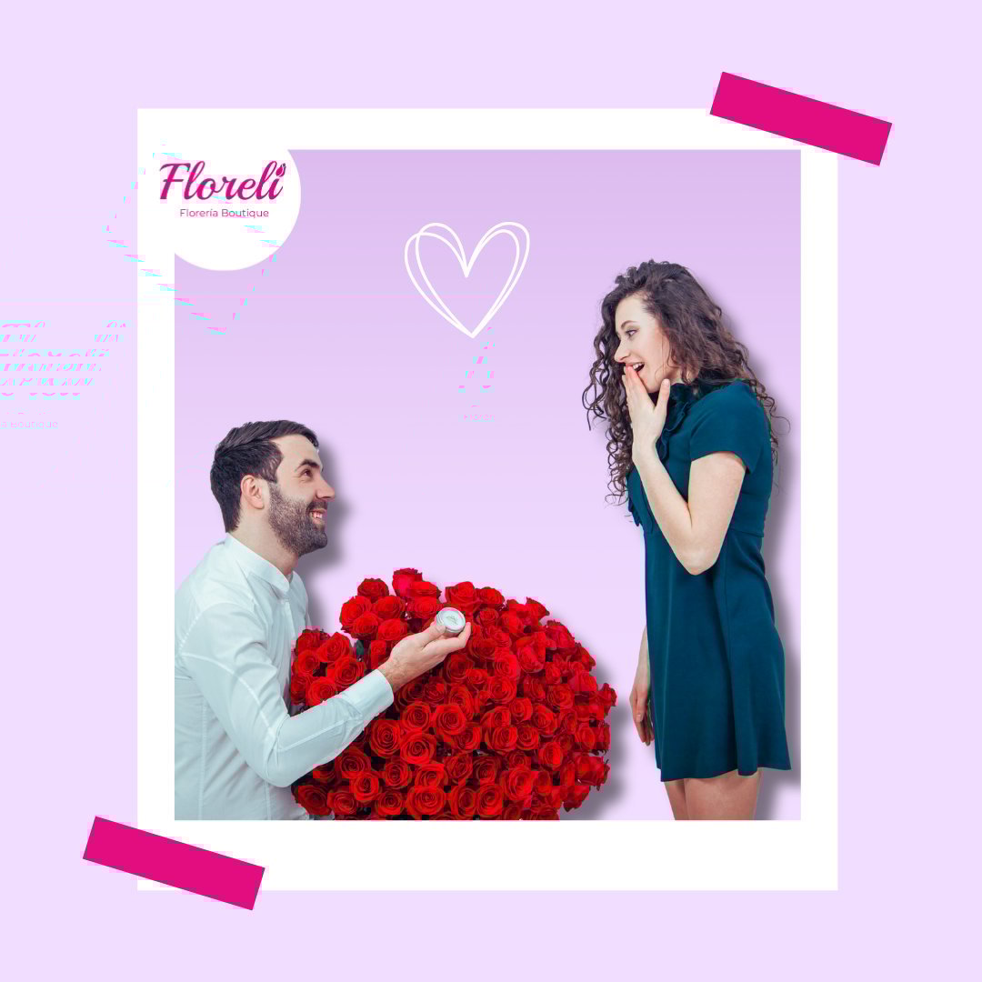 Man proposing to woman with large bouquet of red roses on purple background with Floreli branding